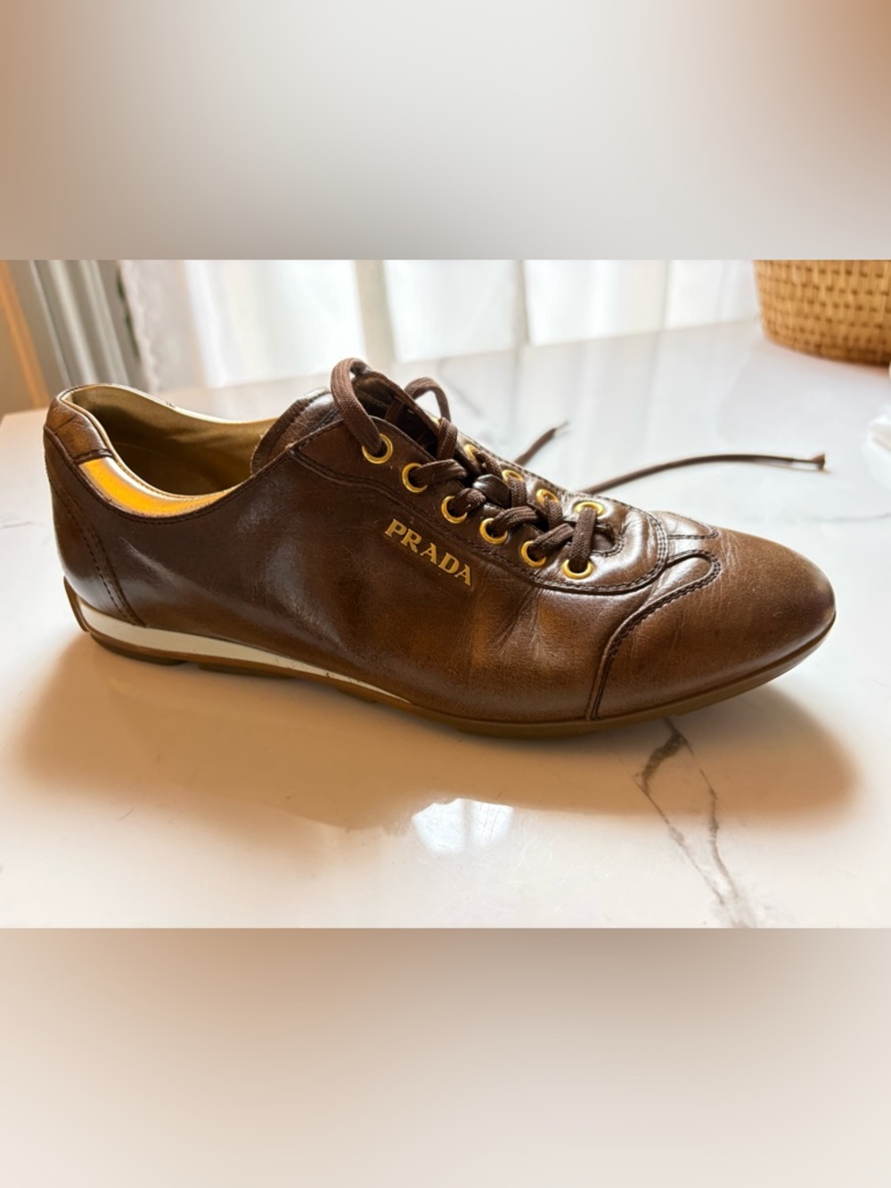 Prada Brown Leather Low-Top Sneaker with Gold Accents